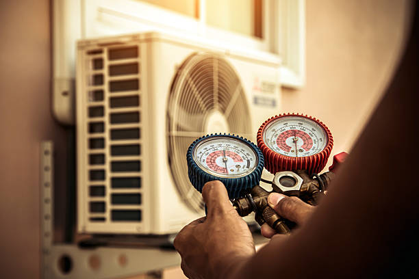 Professional Ac Installation technician working in Forestdale, AL